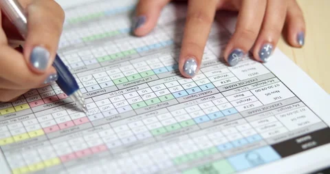 Analyzing data sheets office space business document focused environment Stock Footage 320116924