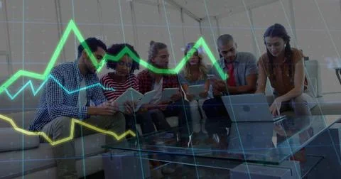 Analyzing data, six professionals using digital devices on sofa in office Foto stock