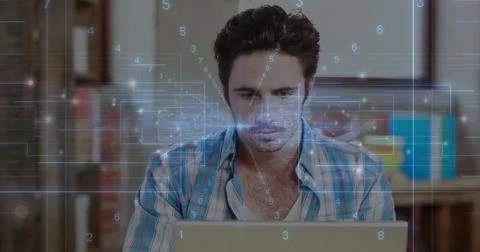 Analyzing data software developer typing code on laptop at home office desk, Foto stock