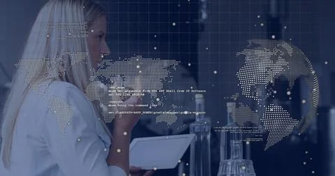 Analyzing data on tablet, woman viewing image with digital world map overlay Stock Photos