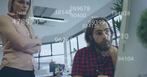 Analyzing data, team in office studying monitor, man in plaid shirt with pencil, Stock Photos