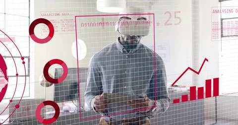 Analyzing data VR professional wearing button-down shirt in office, with VR Stock Photos