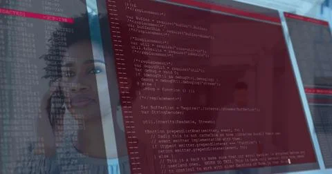 Analyzing developer holding smartphone and gazing at red-tinted code on Stock Photos