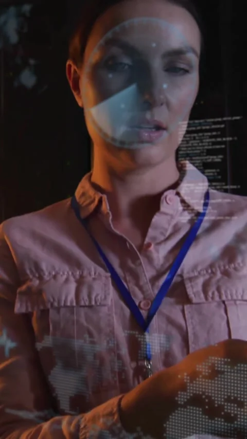 Analyzing digital data projections, woman in dark office environment with Stock Footage 344244746