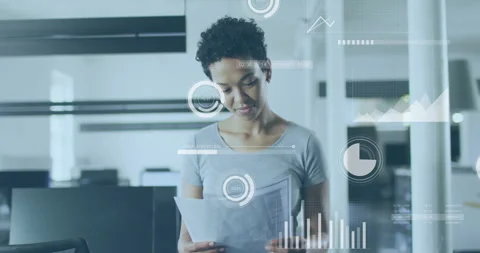 Analyzing documents, businesswoman with data visualization animation over office Stock Footage 306565135