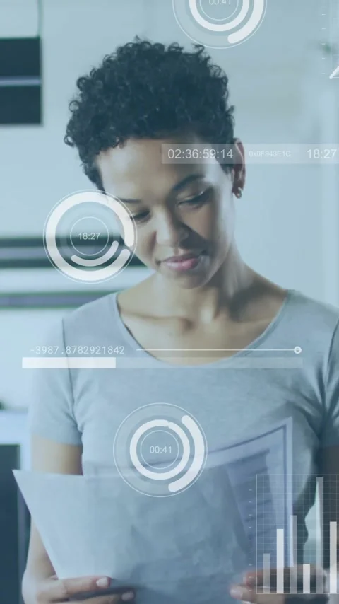 Analyzing documents, businesswoman with data visualization animation over office Stock Footage 341977000