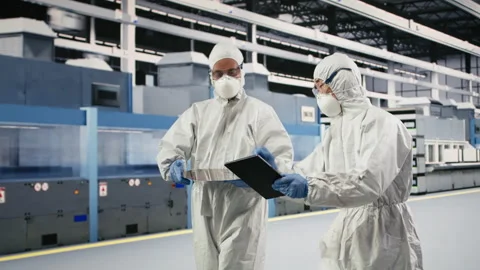 Analyzing electronic component, semiconductor and multiracial technicians Stock Footage 333395508