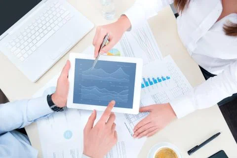 Analyzing financial chart Stock Photos