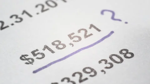 Analyzing of financing statement extremely closeup Stock Footage 23613425