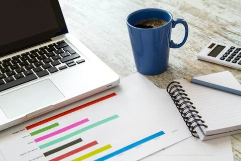 Analyzing graphics. Stock Photos