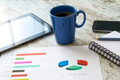 Analyzing graphics. Stock Photos