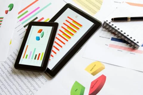 Analyzing graphics with the tablet Stock Photos