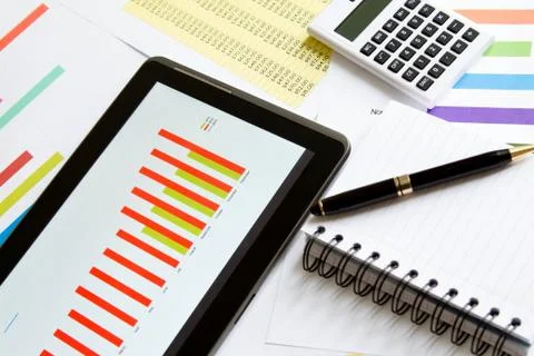 Analyzing graphics with the tablet Stock Photos