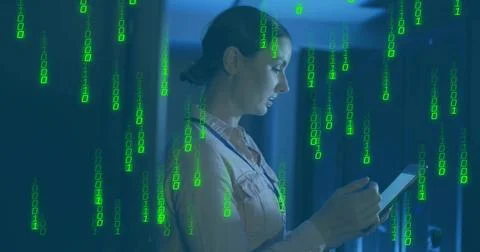 Analyzing IT tech using tablet at servers, LEDs and binary overlay in data 스톡 사진