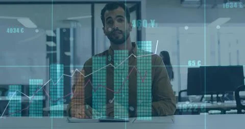 Analyzing male analyst in brown jacket reviewing tablet at open office, with Stock Photos
