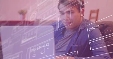 Analyzing man reviewing code on laptop in home office, with potted plant and 写真素材