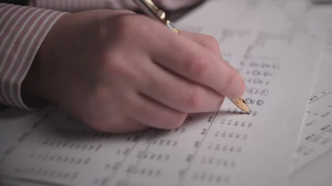 Analyzing Metrics With Gold Pen, Closeup Of Data Inspection In Office, Focused Stock Footage 323924246