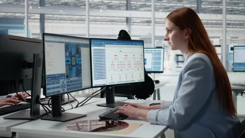 Analyzing PCB architecture, PC software close up and woman in factory office Stock Footage 335880598