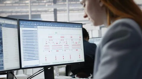 Analyzing PCB architecture, PC software close up and woman in factory office Stock Photos