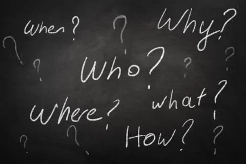 Analyzing problem and find solution by writing question what, where, when, why Stock Photos