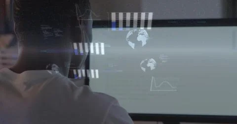 Analyzing rear-view user in light tee reviewing globes, bars, line chart on desk Stock Photos