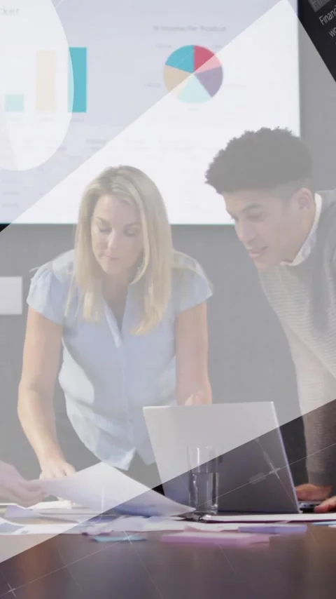 Analyzing sales data with charts, business team collaborating in office Stock Footage 344244825