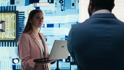 Analyzing semiconductor fabrication, display and engineering team Stock Photos
