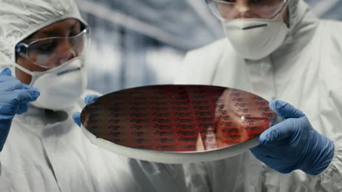 Analyzing semiconductor substrates, microchip and SOC architecture designers Stock Footage 333378306