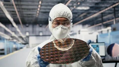 Analyzing silicon wafer, advanced materials trial and close up of technician Video stock 333391862