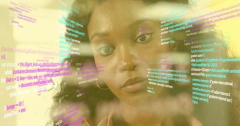 Analyzing software developer reviewing transparent display in tech office, with Stock Photos