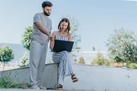 Analyzing statistics, discussing strategy, confident businesspeople meet Stock Photos