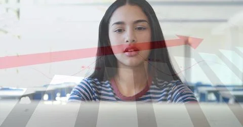 Analyzing student interpreting data on open laptop at computer lab, red arrow Stock Photos