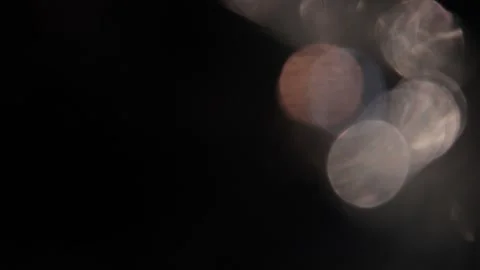 An anamorphic background of multi-colored bokeh light leaks Stock Footage 317455264