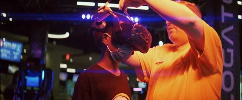 Anamorphic Black Boy Getting Fitted With VR Headset Stock Footage 206804525