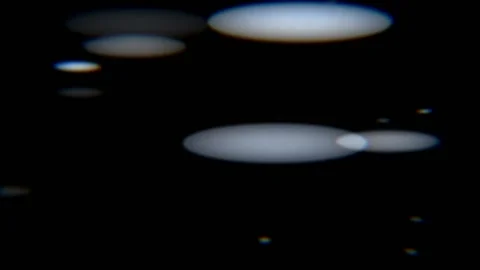 Anamorphic bokeh. The light circles are transformed into ellipses. Stock Footage 145274228