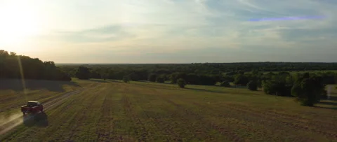 Anamorphic Drone Shot on Dusty Road with Sun Flare Stock Footage 268774087