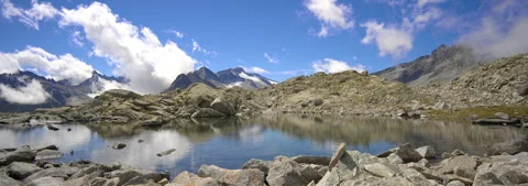Anamorphic Lens 6K - Dark lake at the Presena pass Stock Footage 343254955