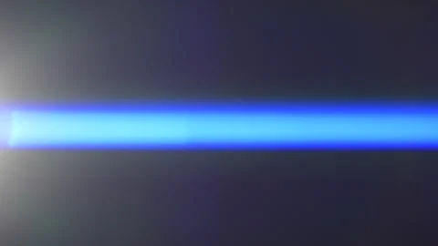 Anamorphic lens flare, bokeh light leaks, flash ray effect over black background Stock Footage 176187538