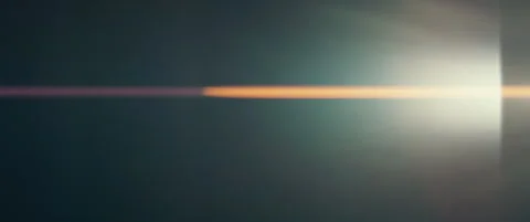Anamorphic lens flare with horizontal golden light leaks. Stock Footage 337744370