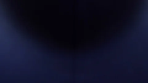 Anamorphic light moves on a dark background 库存影片 124593739