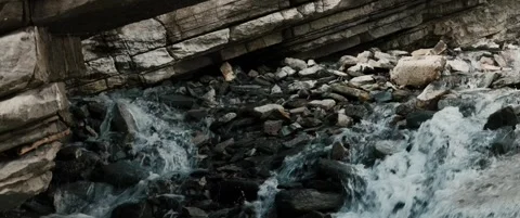 Anamorphic mountain river flowing through rocky canyon Stock Footage 328935223