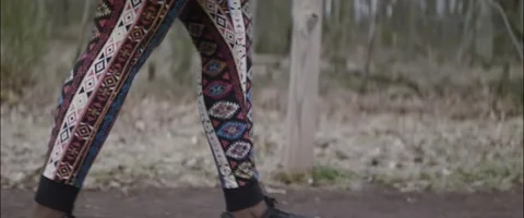 Anamorphic Printed Leggings Walking Medium Side Tracking Low Angle Stock Footage 201266794