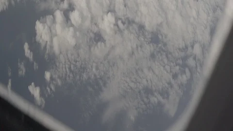 Anamorphic shot above clouds beautiful land clouds helicopter airplane view 2 Stock Footage 118881876