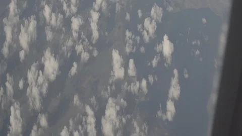 Anamorphic shot above clouds beautiful land earth planet clouds airplane view 4 Stock Footage 118882284