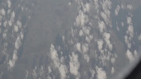 Anamorphic shot above clouds beautiful land earth planet clouds airplane view 5 Stock Footage 118882291