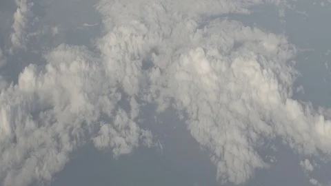 Anamorphic shot above clouds beautiful land earth planet clouds airplane view 6 Stock Footage 118882315