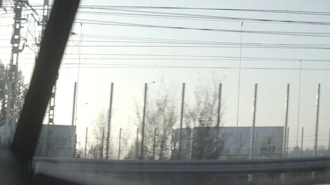 Anamorphic shot view from inside car passing by road highway sunlight Stock Footage 118885519