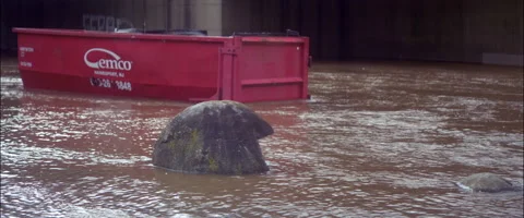 Anamorphic Swollen River Rock And Dumpster 1 Stock Footage 233520078