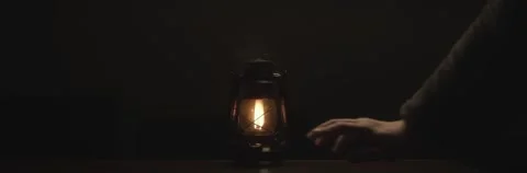 Anamorphic video of kerosene lamp light or an ancient lantern flickers in the Stock Footage 264767608
