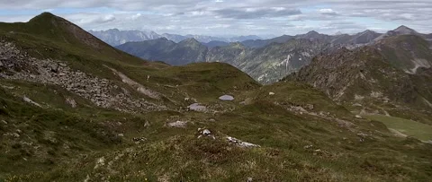 Anamorphic View of the Alps Mountains on a Cloudy Summer Day. Stock Footage 339630944